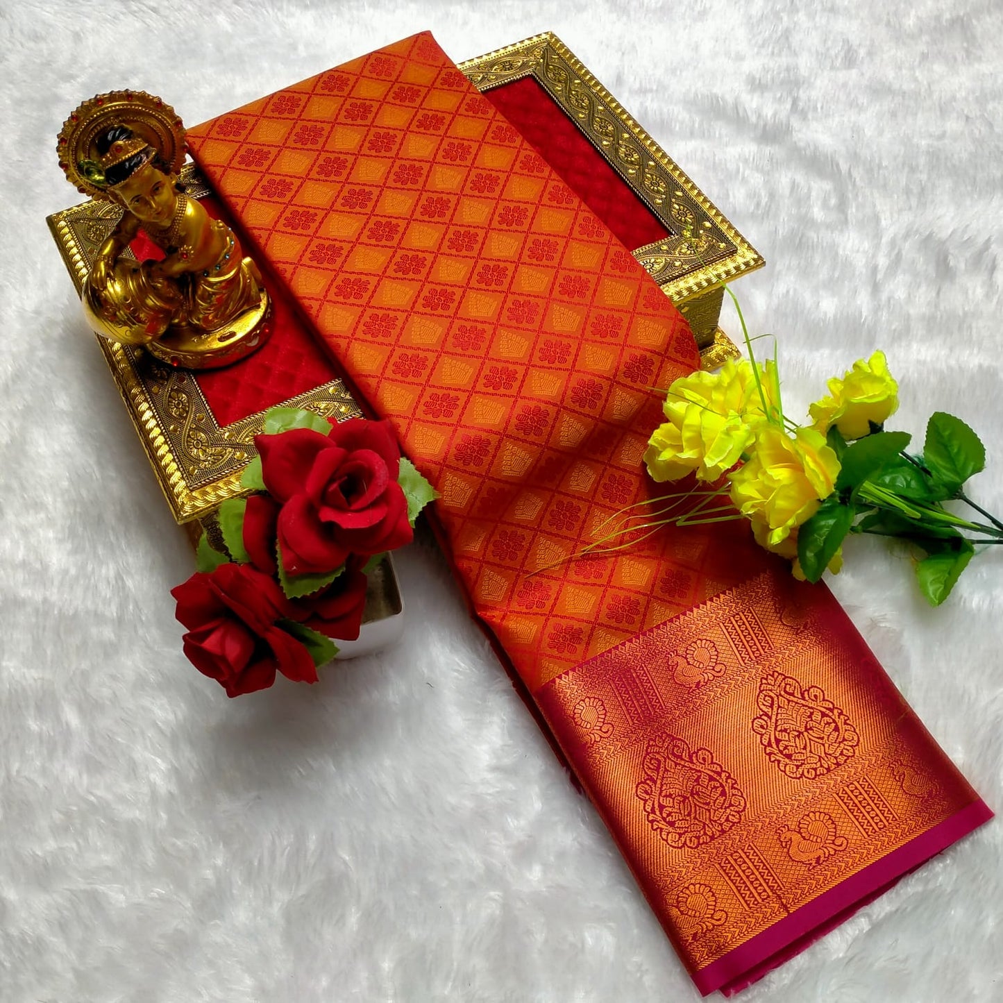 Vibrant Orange Soft Silk Saree with Traditional Red Zari Border - PTS023
