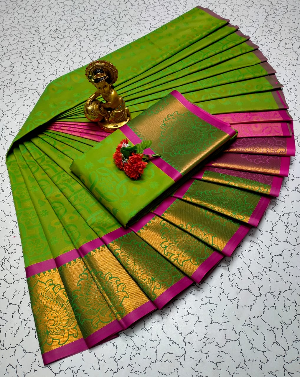 Elegant Green Soft Silk Saree with Contrast Gold Zari Border - PTS021